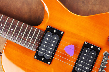 Fototapeta na wymiar violet guitar pick