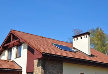 Cozy house Roofing with Vacuum Solar Water Panel Heating, Solar Panels, Skylights Outdoor.
