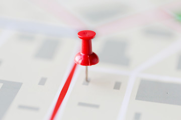 close up of map or city plan with pin