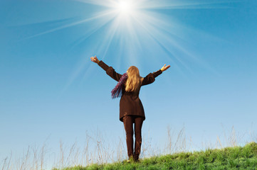  Young girl pulls hands praying sky