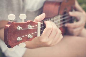 Hand playing guitar