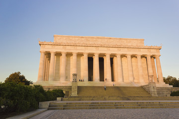 The early morning sunshine beginning to cover the eastern facade of the Lincoln Memorial & plaza, National Mall and Memorial Parks, Washington DC