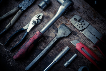 Tools on wooden plank