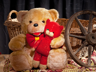 teddy bear is sitting in front of wicker basket