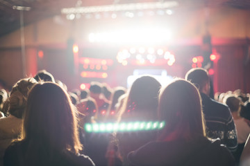 Audience watching the scene with artists.