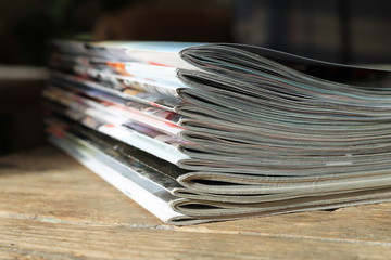 Magazines on the wooden table