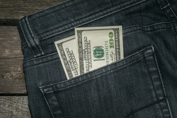 American Dollars in the Pocket of the Jeans. Сloseup.