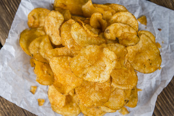Portion of crispy Potato Chips (selective focus)