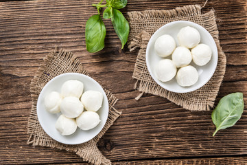 Old wooden table with Mozzarella