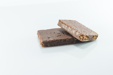 Snacks coated chocolate wafers.