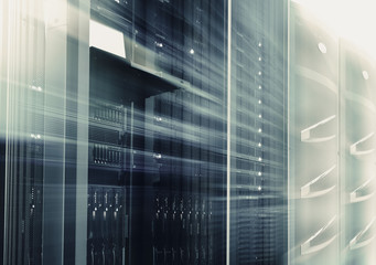 mainframes cluster  with control terminal in data center. motion blur. bottom view