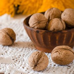 Walnuts in a bowl on the table