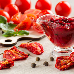 Sauce-BBQ, sun-dried tomatoes, spices, tomatoes and Basil on the