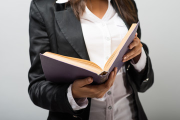 young woman reading a book