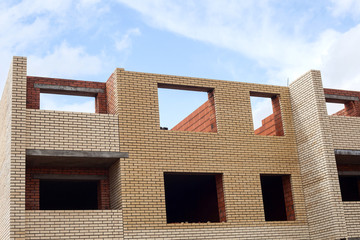 Construction of a brick apartment building
