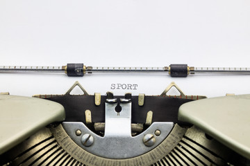 Sport word on sheet of typewriter