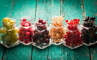 Fresh summer berries , wooden background, healthy food.