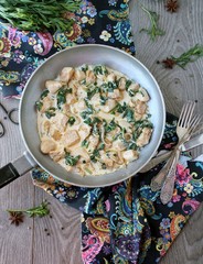 chicken in a creamy sauce with spinach and tarragon