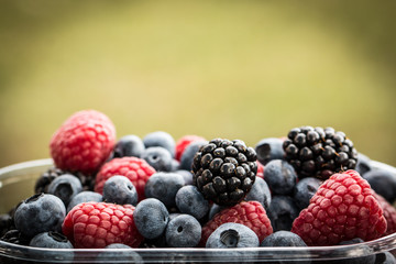 Fresh summer berries , wooden background, healthy food.