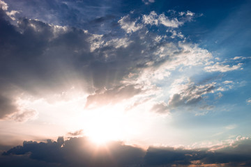 Fototapeta na wymiar Cloudscape with sun and clouds