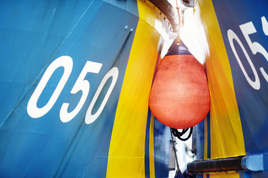 Buoy between two boats