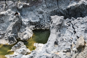 The river Simeto across an ancient lava flow near Adrano