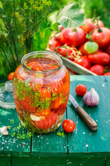 Fresh cherry tomatoes in the jar