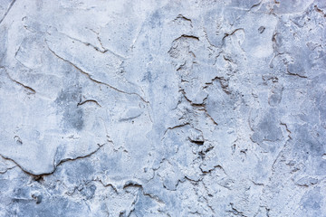 The surface of the uneven hardened cement mortar