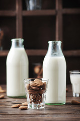 Vegan Almond milk on the wooden table