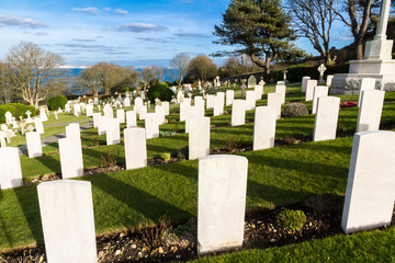 Backs of war graves, military cemetery.