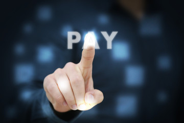 Businessman touching Pay