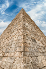 Fototapeta na wymiar Pyramid of Cestius, iconic landmark in Rome, Italy