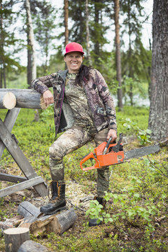 Woman with chainsaw