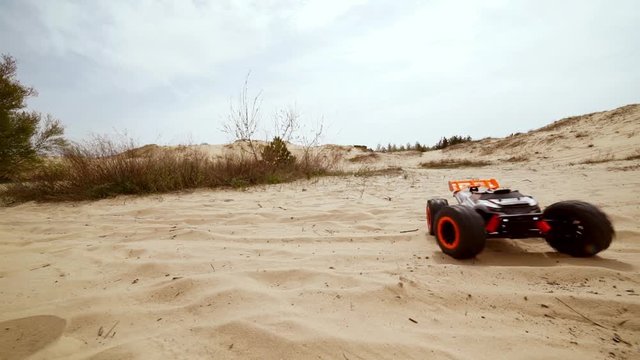 Family spending time together and having fun in Oleshky sands.Ukraine. Slow motion
