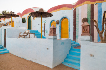 Traditional colorful houses in Nubian village in Aswan, Egypt. - 109272538
