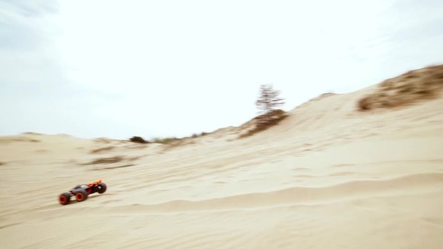 Family spending time together and having fun in Oleshky sands.Ukraine. Slow motion