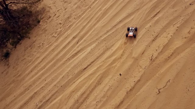 Family spending time together and having fun in Oleshky sands.Ukraine. Slow motion