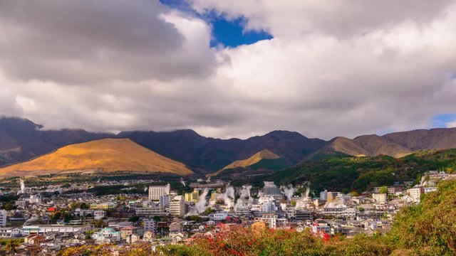 Beppu, Japan cityscape with hot spring bath houses.