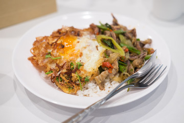 Thai food on steam jasmine rice