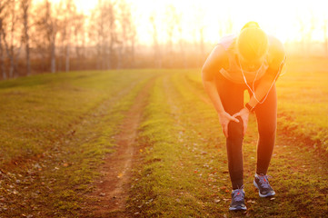 Injuries - sports running knee injury on woman.