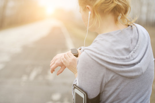 Watch for sports with smartwatch. Jogging training for marathon.