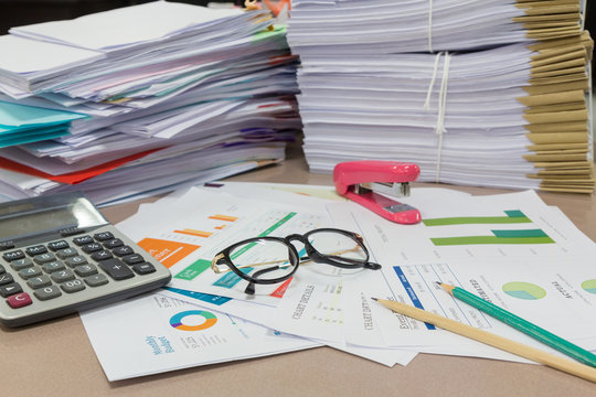 Analysis chart and paperwork on office table