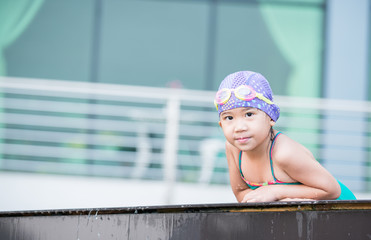 cute girl in swimming pool