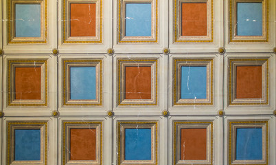 Square orange and blue painted on the ceiling.