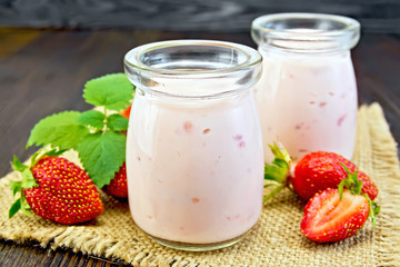 Yogurt with strawberries on sacking