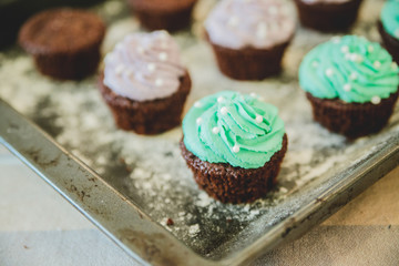 colorful cupcakes for Breakfast are on the table