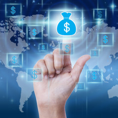 Hand pressing money bag icon on virtual screen. saving money concept