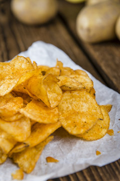 Portion of crispy Potato Chips (selective focus)
