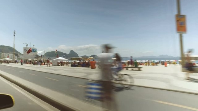 Copacabana Beach full of people in Rio De Janeiro. Vintage colors
