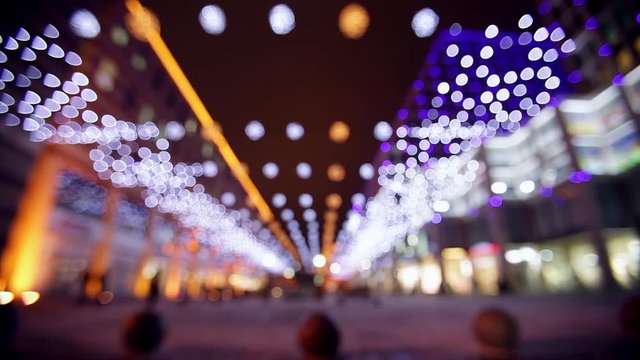 Night street with steaming tower bokeh